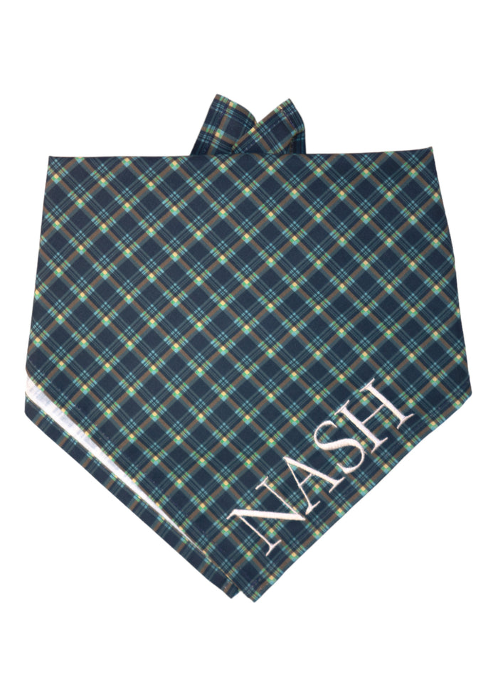 Stylish plaid dog bandana in navy with light tartan lines. The triangular fold and tie-back design make it easy to wear, while the soft, lightweight fabric provides comfort for all-day use. Embroidered on the right side is the name "Nash".