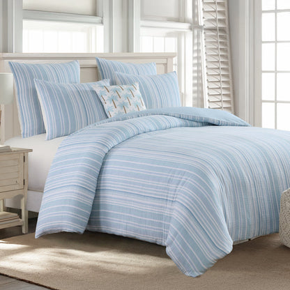 Boracay Stripe Muslin Duvet Cover Set featuring soothing aqua and white striped design on a cozy bed.