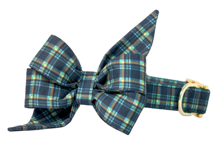 Elegant tartan plaid dog collar in rich navy tones, complete with a matching, bold bow tie for a sophisticated look. Finished with a metal buckle and D-ring, it blends style and function for special occasions or everyday wear.