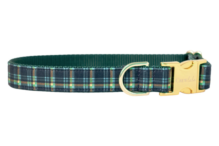 High-quality, adjustable dog collar covered in a timeless plaid fabric, layered over durable nylon webbing. Designed with a metal engraved buckle and sturdy D-ring for secure attachment, this collar combines classic style with practical functionality for everyday wear or special occasions.