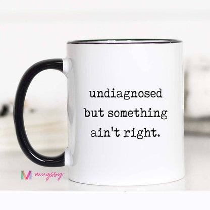 Funny Coffee Mug – Undiagnosed But Something Ain’t Right: 15oz / All white
