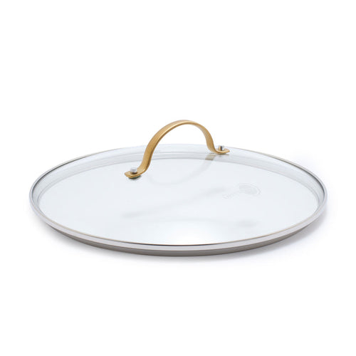 Tempered glass lid with matte gold handle, shown angled on a white background.