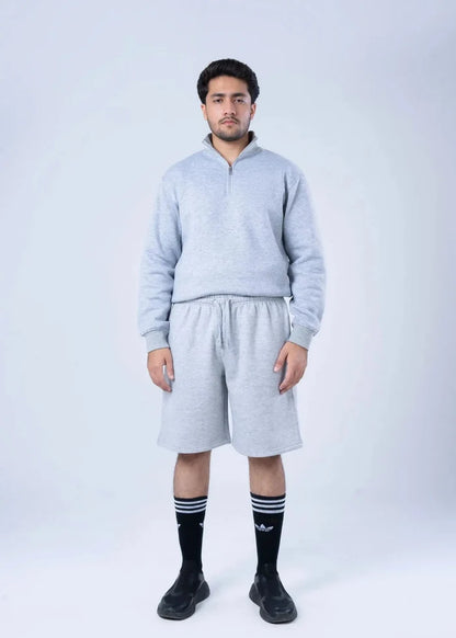 Men's light grey fleece drawstring sweat shorts with elastic waist, knee-length cut
