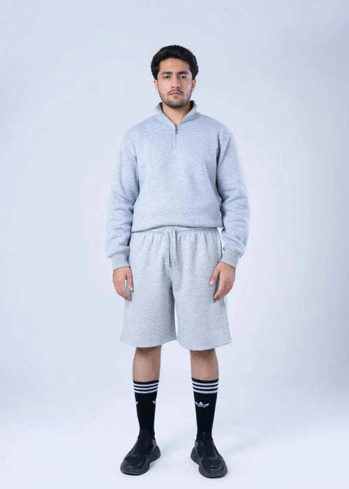 Men's light grey fleece drawstring sweat shorts with elastic waist, knee-length cut