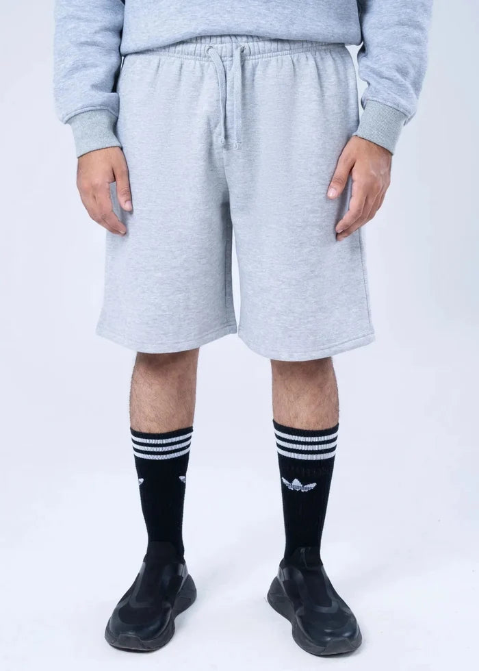 Men's light grey fleece sweat shorts with elastic waistband and front drawstring
