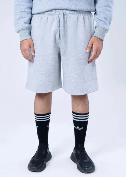 Men's light grey fleece sweat shorts with elastic waistband and front drawstring