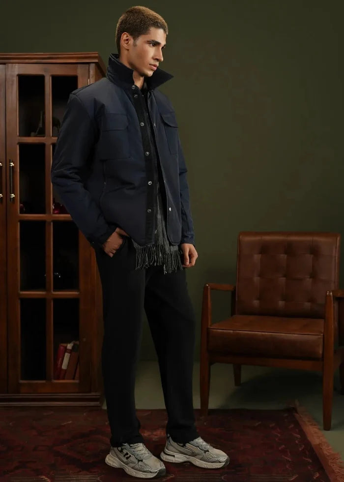 Men's navy winter memory jacket with hood, snap front, and side pockets.