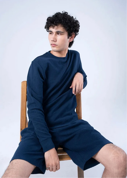 Navy crewneck sweatshirt and matching shorts set with ribbed cuffs and straight hem