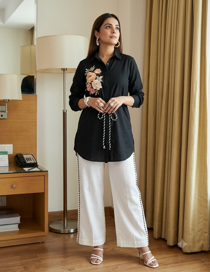 Black Bemberg Silk Co-Ord Set featuring a sculpted floral tie-detail shirt paired with ivory straight-fit pants for an elegant and contemporary look.