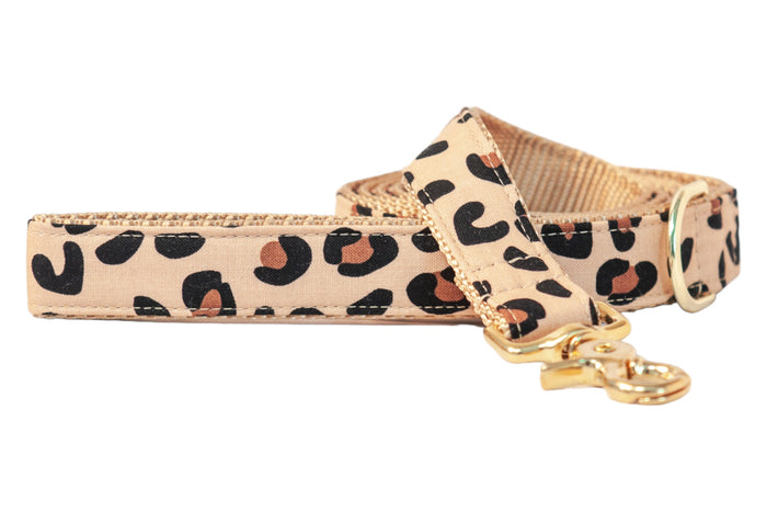 Unleash your pup’s wild side with this leopard-print dog leash, featuring durable stitching and fierce fashion flair.