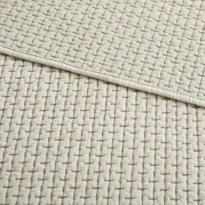 Close-up of the Pick-Stitch Artisan Quilted Throw showcasing detailed pick-stitch texture on cotton slub fabric.