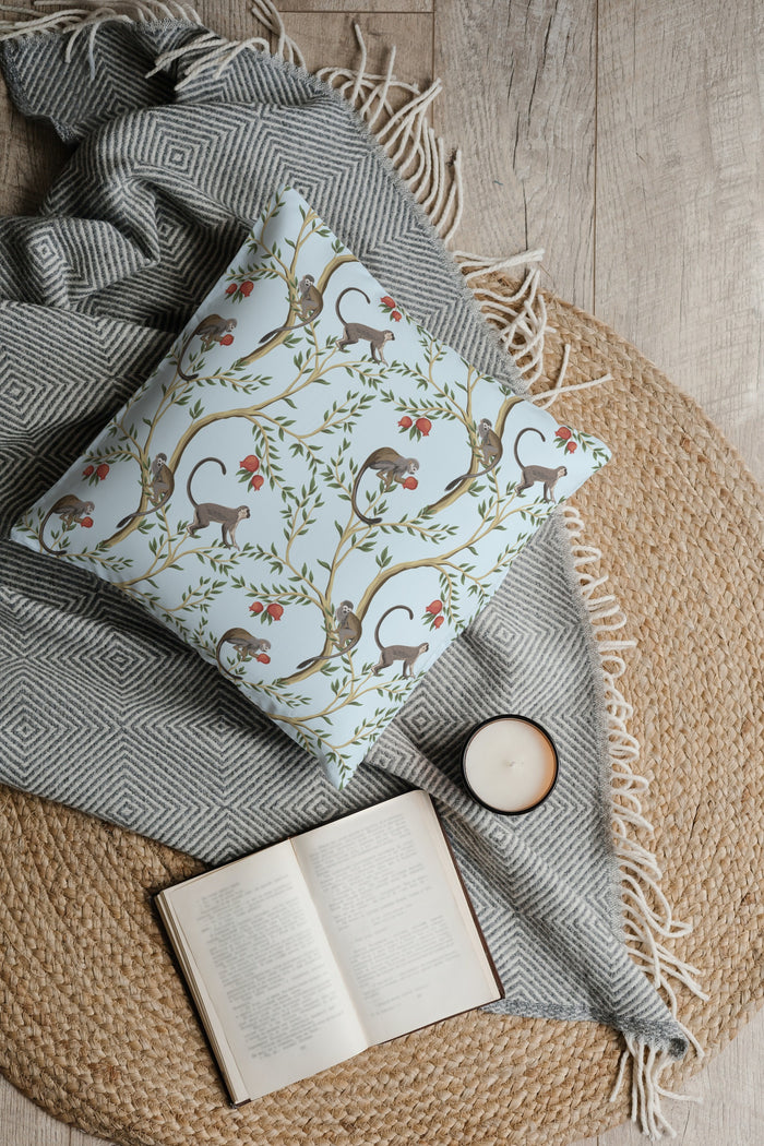Playful Pomegranate Monkeys Outdoor Pillows Light Blue