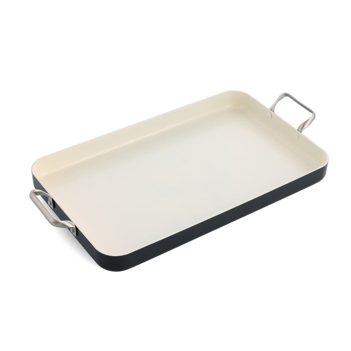 Double griddle with black finish, stainless steel handles, and high sides on a white background.