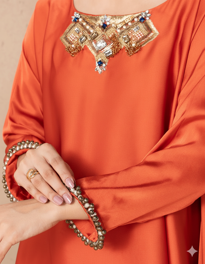 Rust Zola tunic featuring a stylish design and comfortable fit for casual outings.