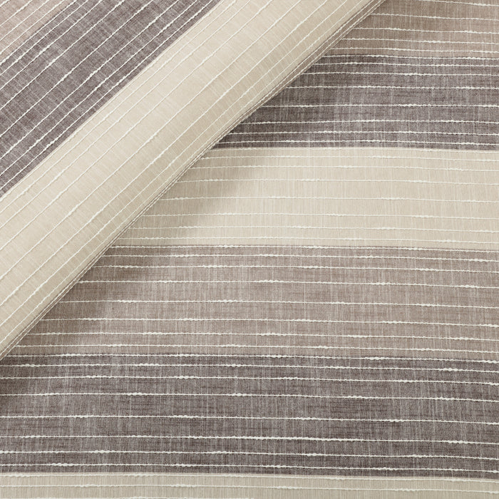 Close-up of a textured fabric with horizontal stripes in neutral colors.
