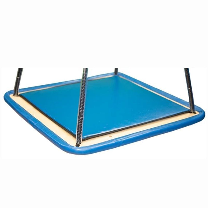 Southpaw replacement vinyl pad for swings in blue, fitted to a square platform swing with padded edges, an easy-clean therapy swing pad for sensory rooms and OT clinics