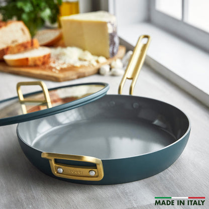 Venetian teal ceramic 12-inch frypan with matching glass lid, handle visible.