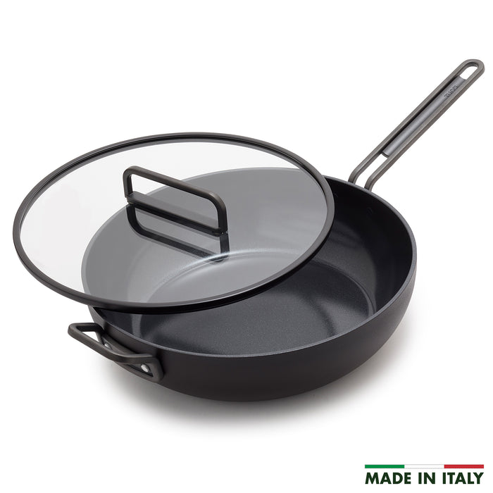 Milano Black ceramic 6.5-quart pan with glass lid and metal handles.