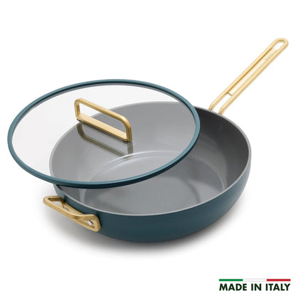 Ceramic 6.5-quart essential pan in Venetian teal with a glass lid, shown as a single piece.