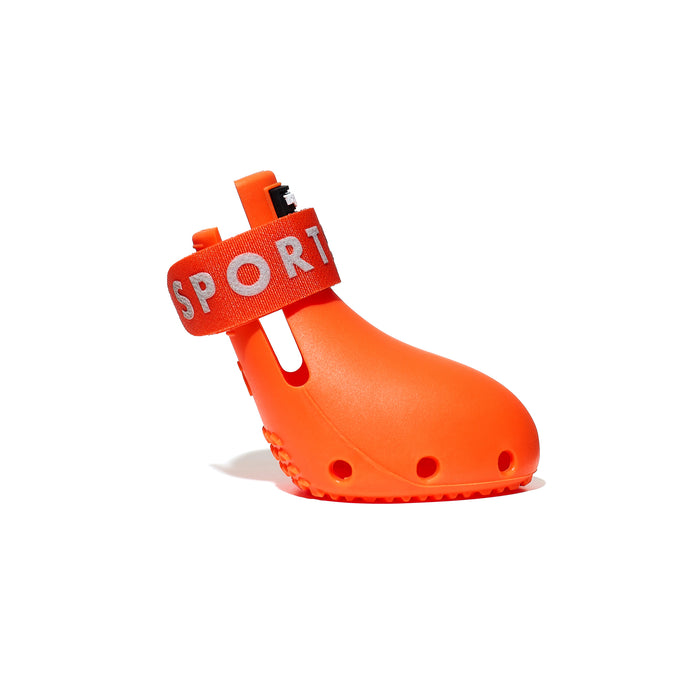 Orange dog boot with a reflective 'SPORT' strap on a white background