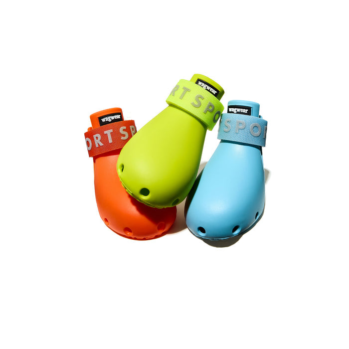 Three colorful dog boots with 'Wagwear' branding on a white background