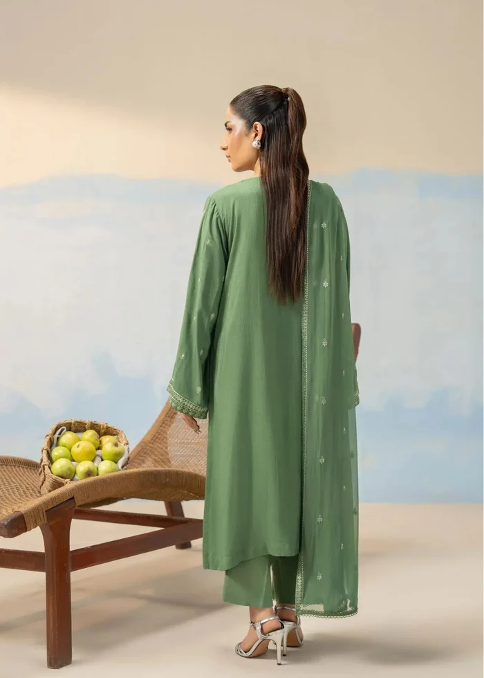 Green long tunic and pants suit with decorative back yoke and sheer dupatta