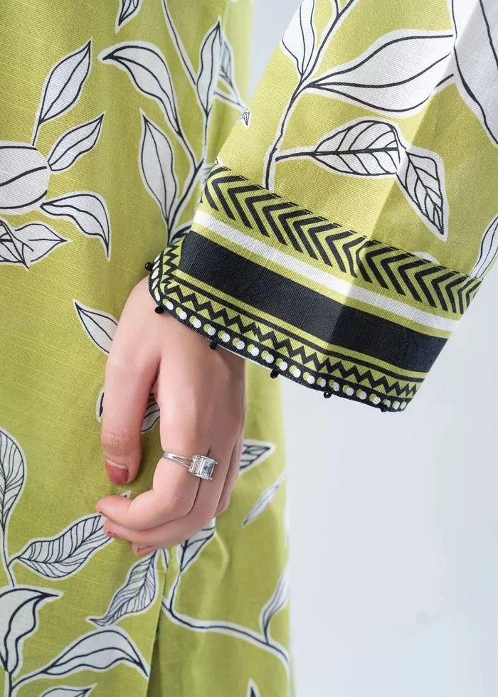 Lime green printed sleeve with black-and-olive striped cuff and pom trim, co-ord set